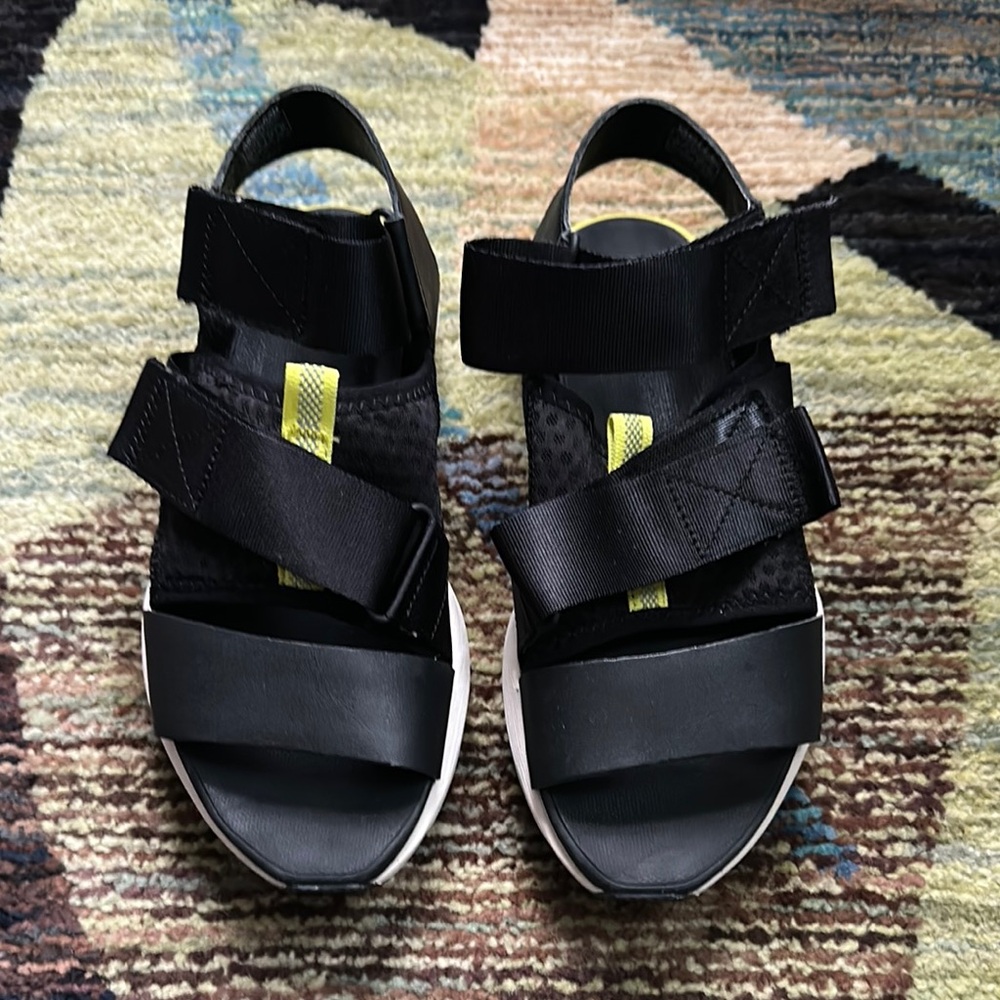 Chic Black Sandals with Yellow Straps
